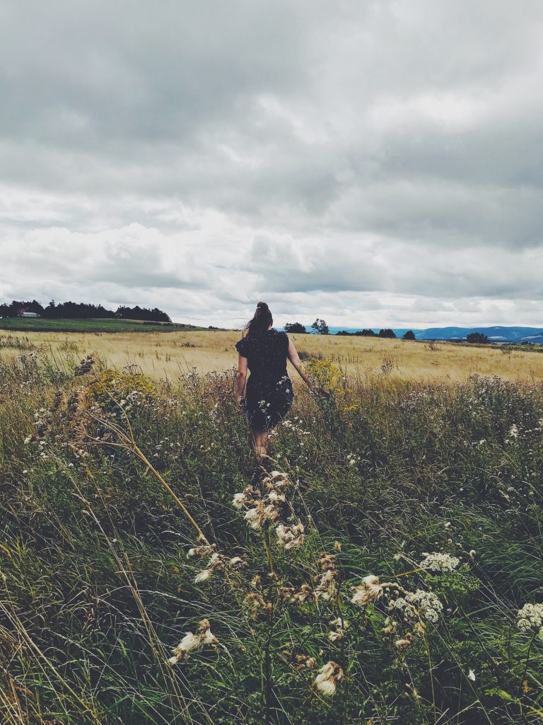 Woman walking through a field - NOMINATED ☁️🙌🏼 -